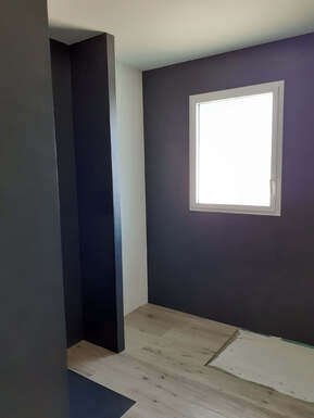 Salle de bain en béton ciré sur murs